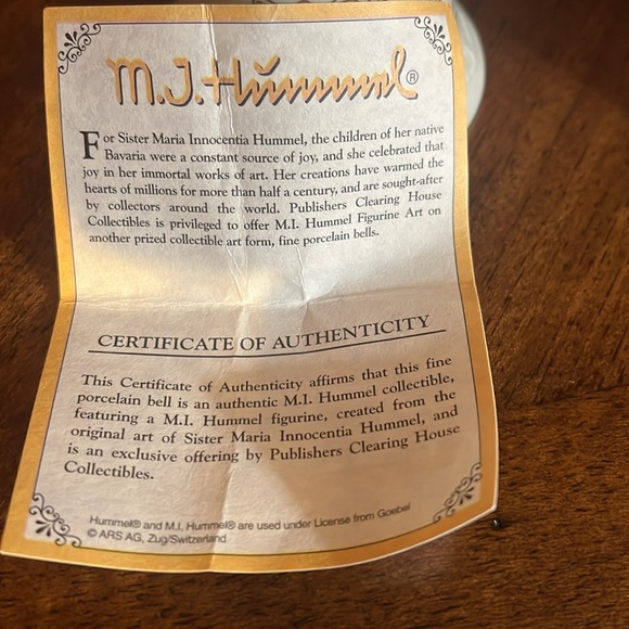 Vintage M.J. Hummel "retreat to Lafety" Porcelain
Bell w/Wooden Handle. - Picture 3 of 3